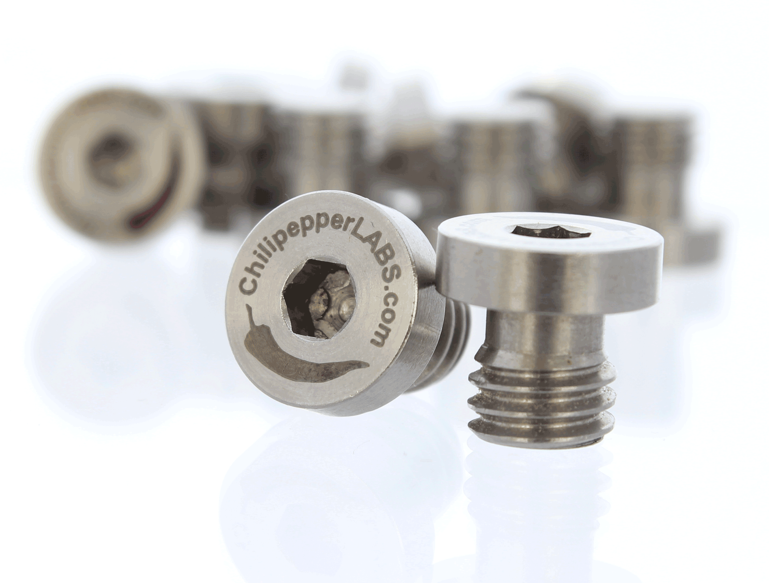 Captive-Socket-38-16-x-9mm-long-Camera-Tie-Down-Screw-With-Logo_2.gif
