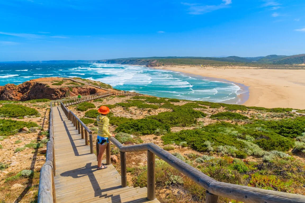 Person-looking-at-Praia-da-Bordeira.jpg
