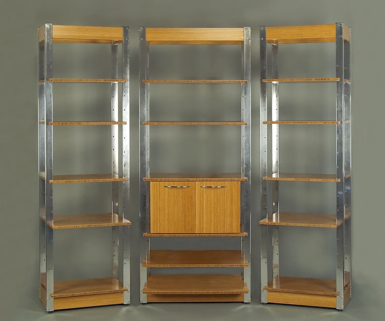 Modular Shelving. Polished Aluminum and Carmelized Bamboo.