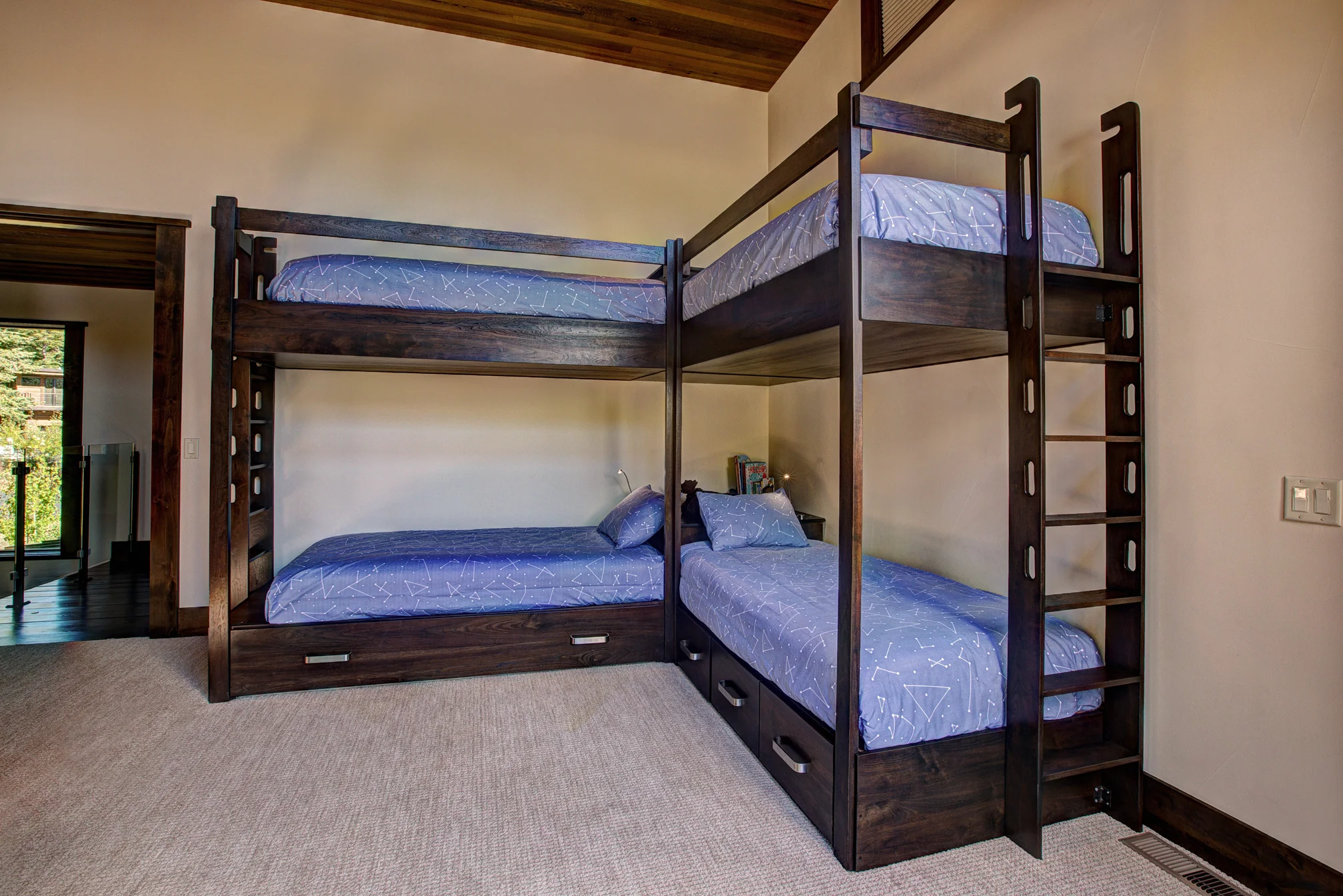Built-in Bunk Beds with Trundle and Drawers. Walnut. Headboard/Nightstand Combination and Built-in Lighting.