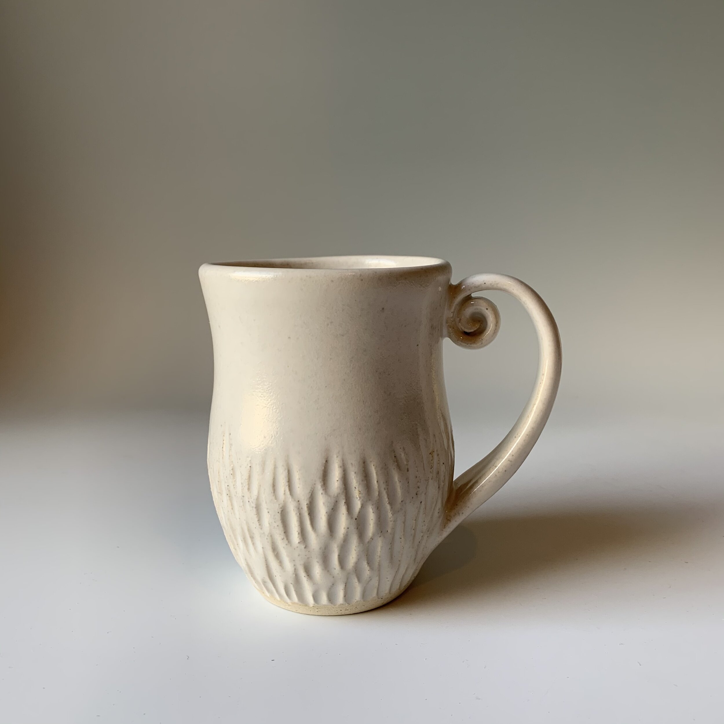 Carved White Mug
