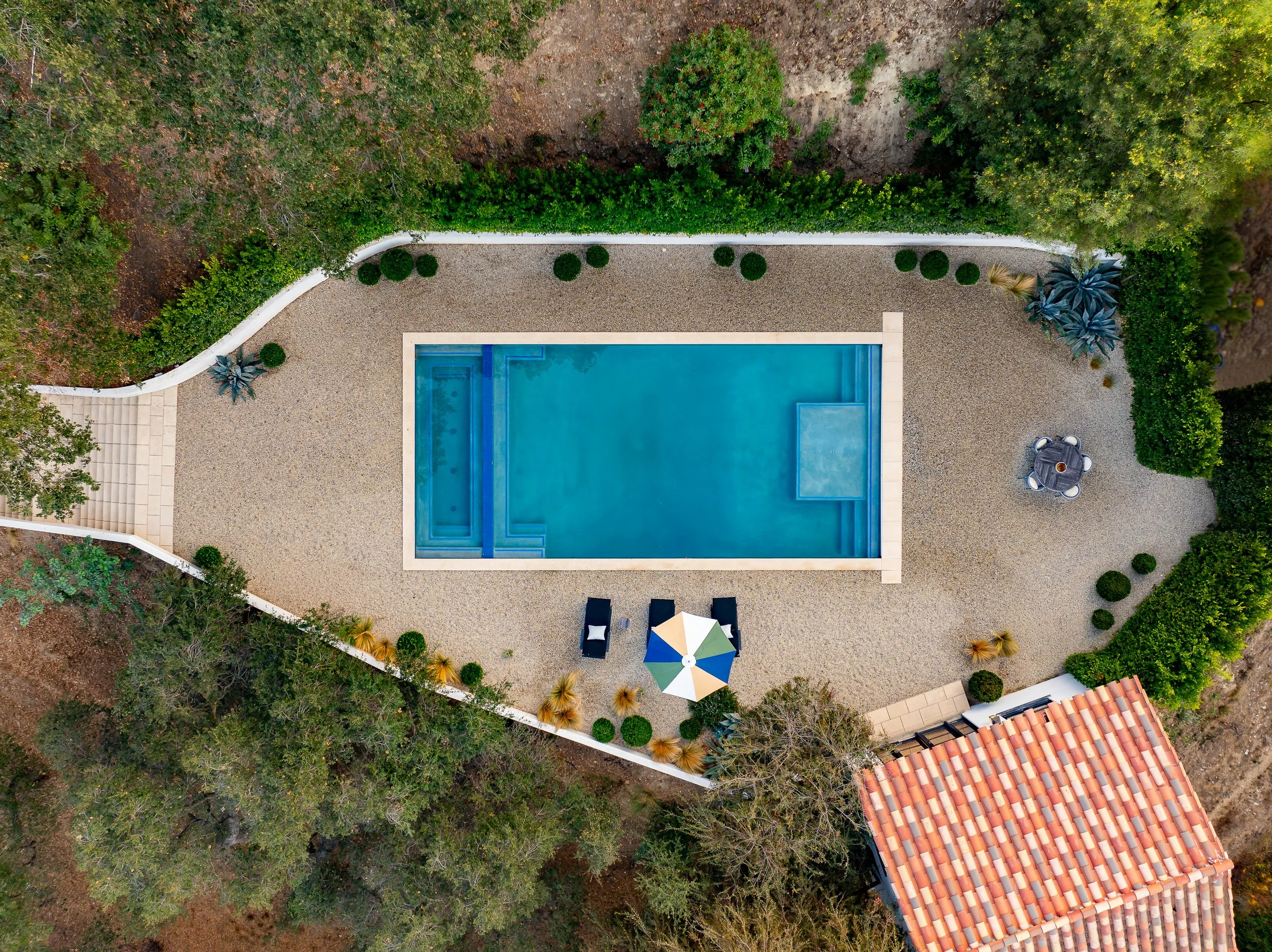 Aerial real estate photography of a Hollywood Hills luxury home with pool by Wayne Ford.