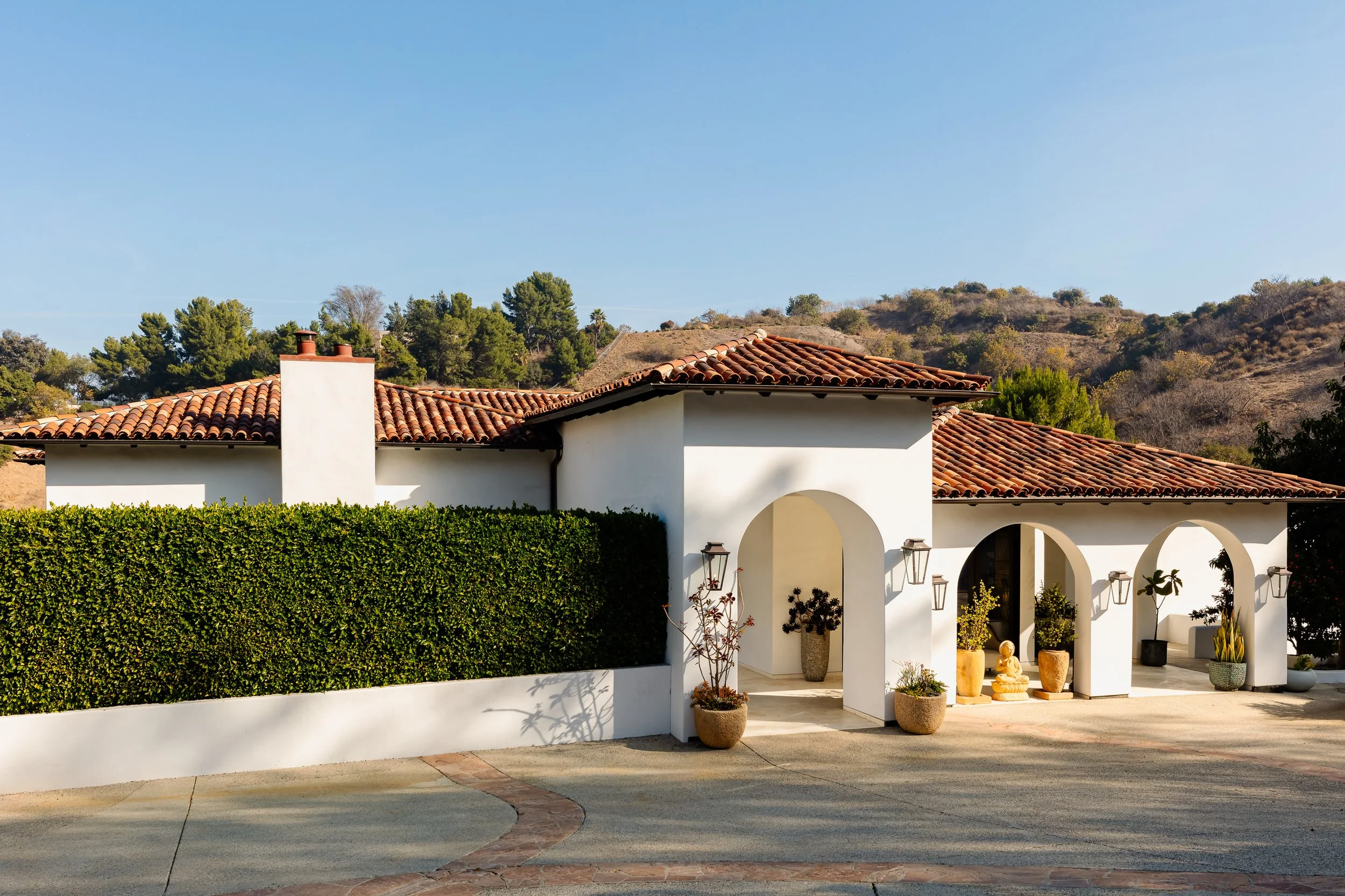 Architectural exterior real estate photography of a modern Hollywood Hills property