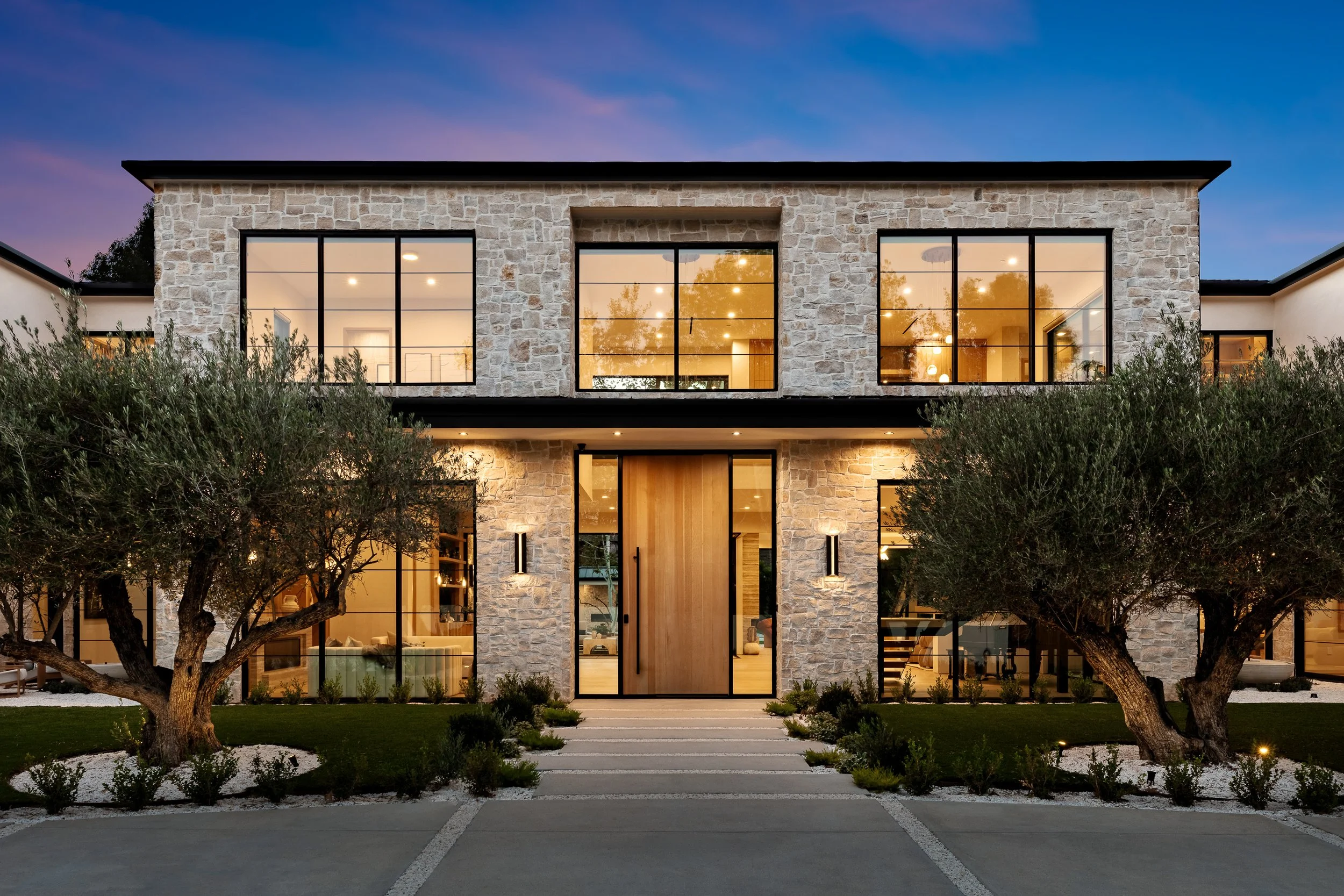 Exterior real estate photography of a luxury Los Angeles home at twilight
