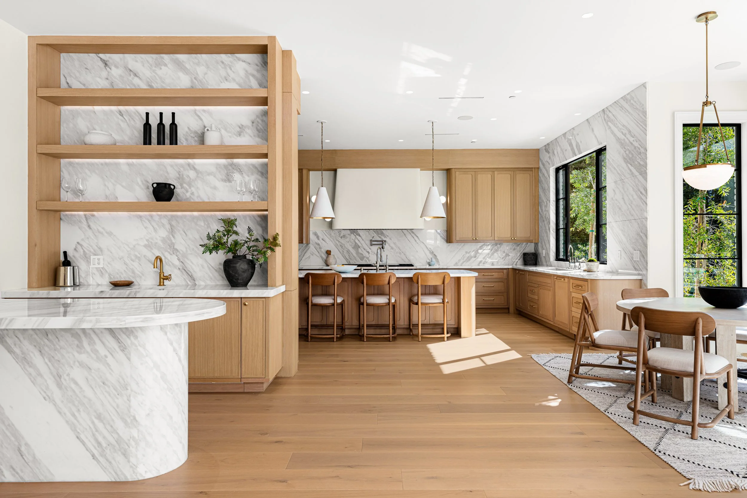A sleek modern kitchen and bar in a Beverly Hills home.