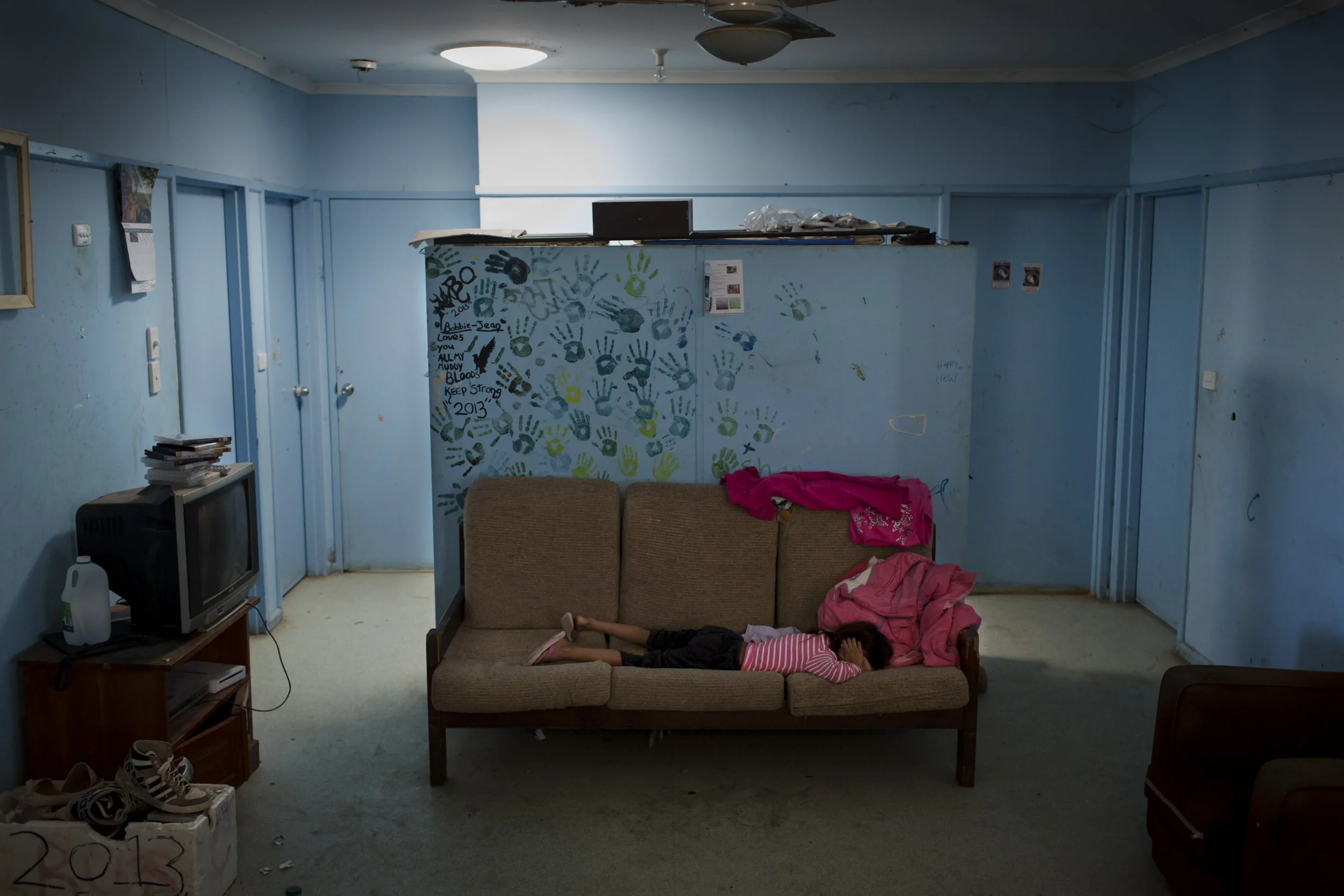 A young girl cries after a fight with her sister in Wilcannia, NSW.