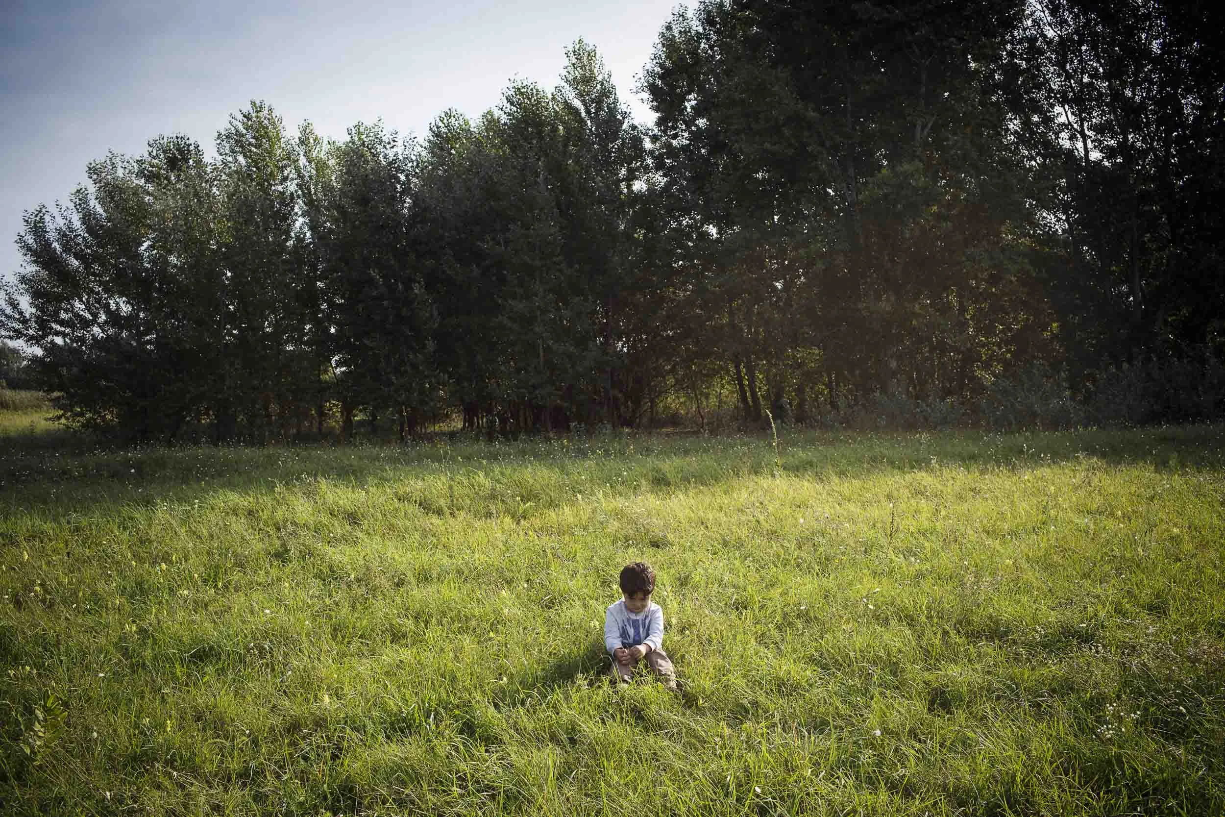 Horgoš, Serbia. A young refugee boy separated from his parents at the Serbia/Hungary border. 