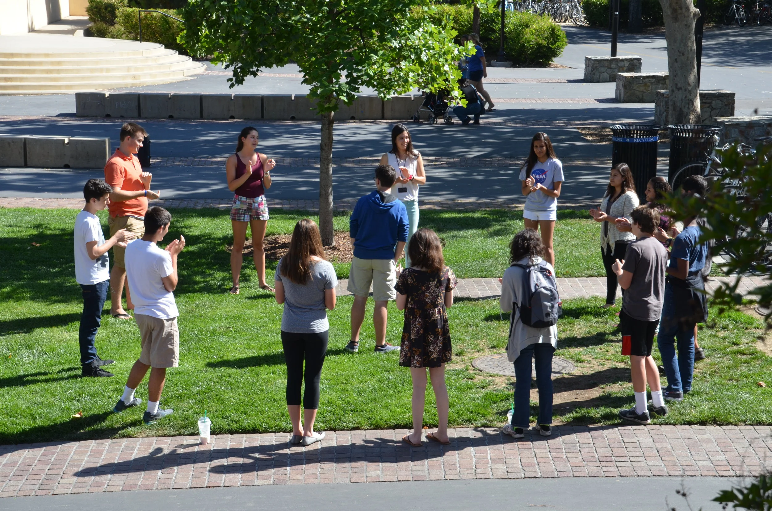 Kids standing in a circle outside