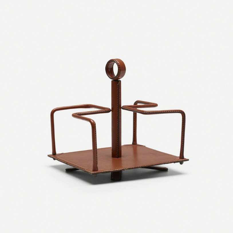 Attributed to Jacques Adnet desk caddy, c. 1950 Saddle-stitched leather over steel, brass