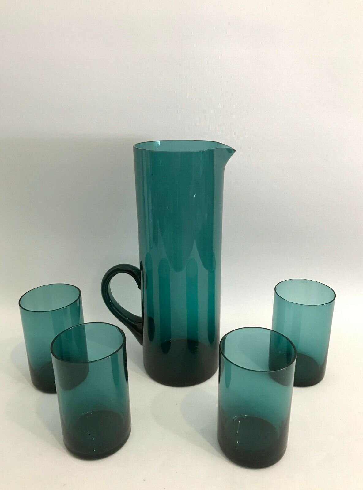 Glass pitcher and 4 glasses £79.54