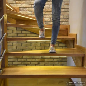 Stair-lights-walking-up-on-L-shaped-stairs