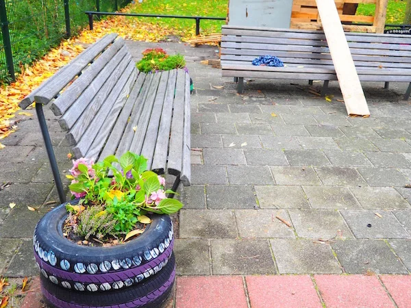 Children asked to bring flowers near the benches and to put them close together