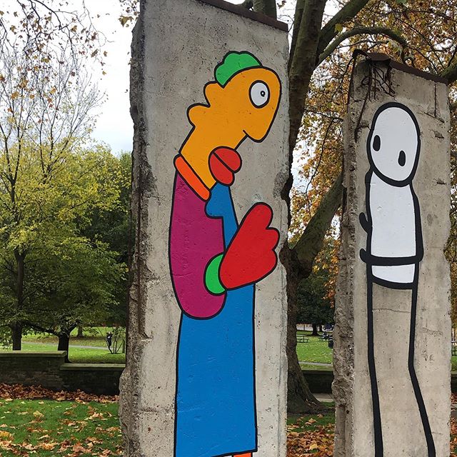 Two of the iconic street art figures on two pieces of the Berlin Wall looking at each other to commemorate the 30th anniversary of the fall of the Berlin Wall. 👏 @stikstudio @thierrynoir the creators of these characters that contribute to make our s