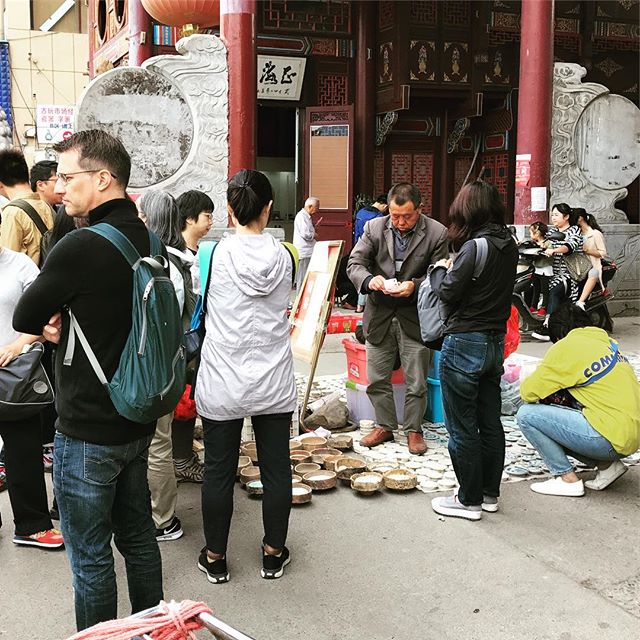 I love how this salesman is just standing on his wares #jingdezhen #ghostmarket