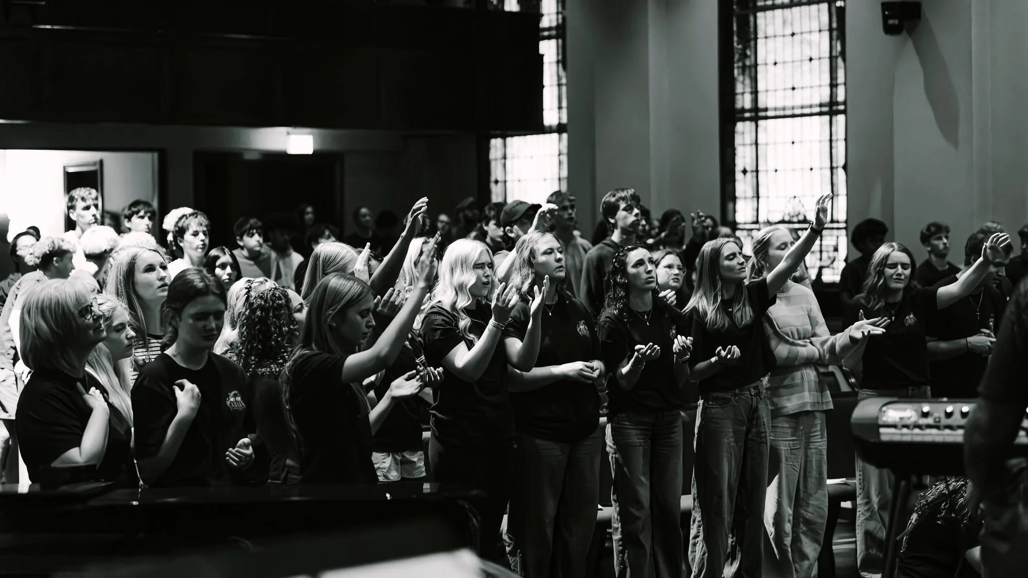 Students worshiping together