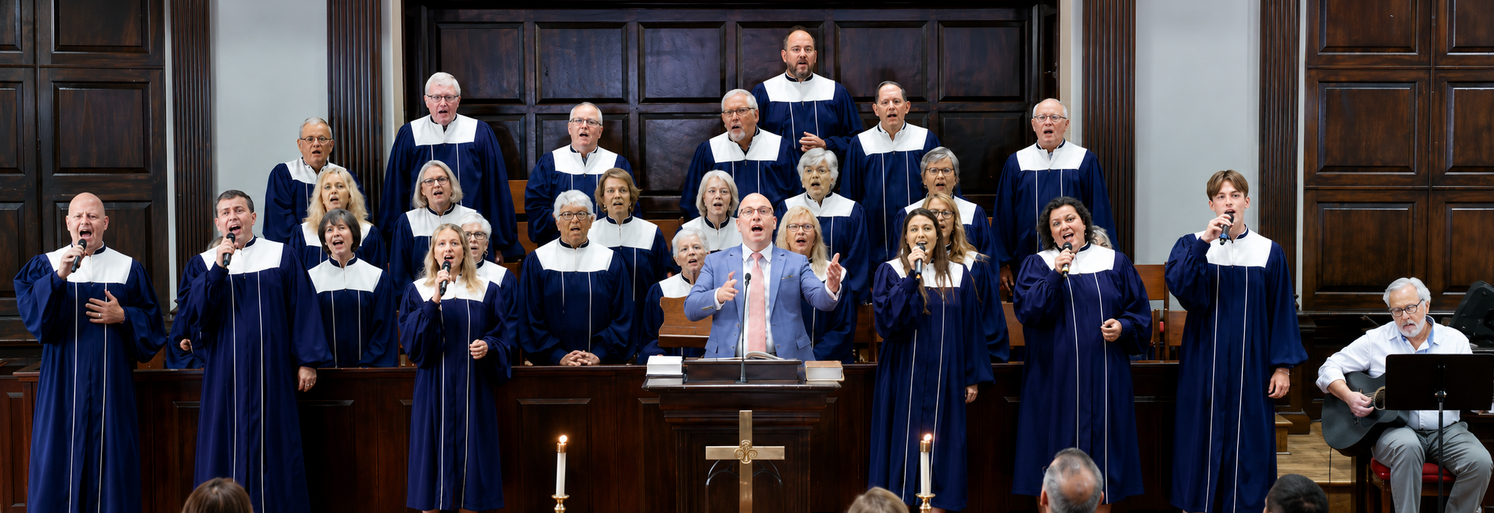 The FBC choir and praise team singing in the sanctuary