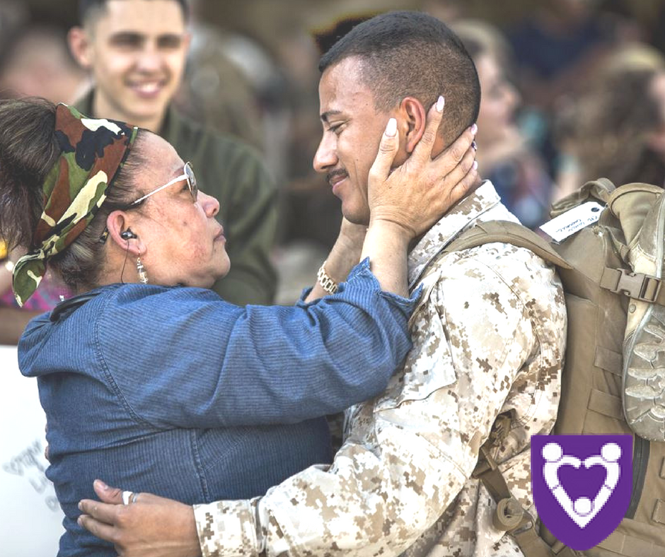 A Marine reunites with a family member, May 15, 2017. Marine Corps photo by Lance Cpl. Zachary M. Ford