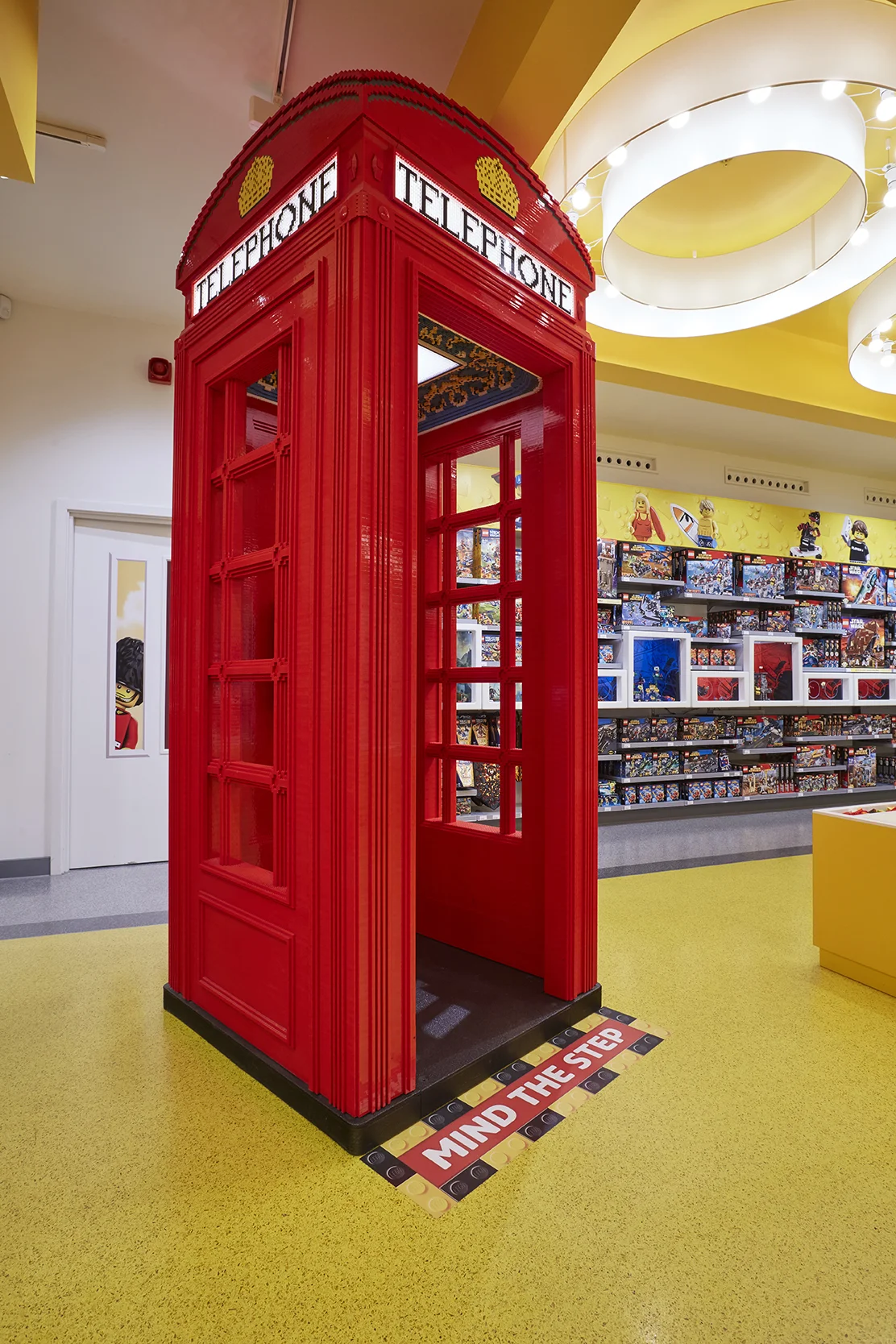 LEGO telephone box with vinyl on the floor