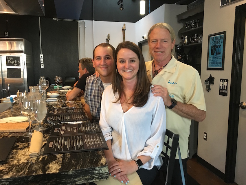 Eliza and Mike with Peter at during their destination wedding week at Sandals Royal Barbados