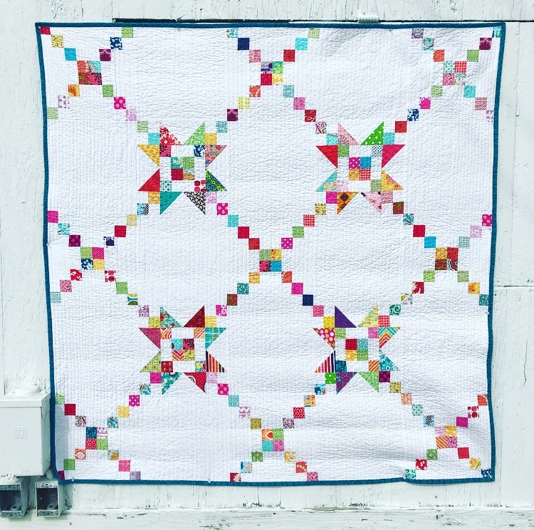 Scrappy Irish Chain Quilt by AnneMarie Chany.jpeg