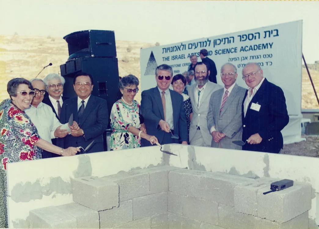 From left: Mary Jane Asher, Minister of Education Yitzhak Navon, Daniel Lowe, Senator Daniel Inouye, Lynn Schusterman, Bob Asher, Judith and Gil Asher, Charles Schusterman, Irwin Hochberg.