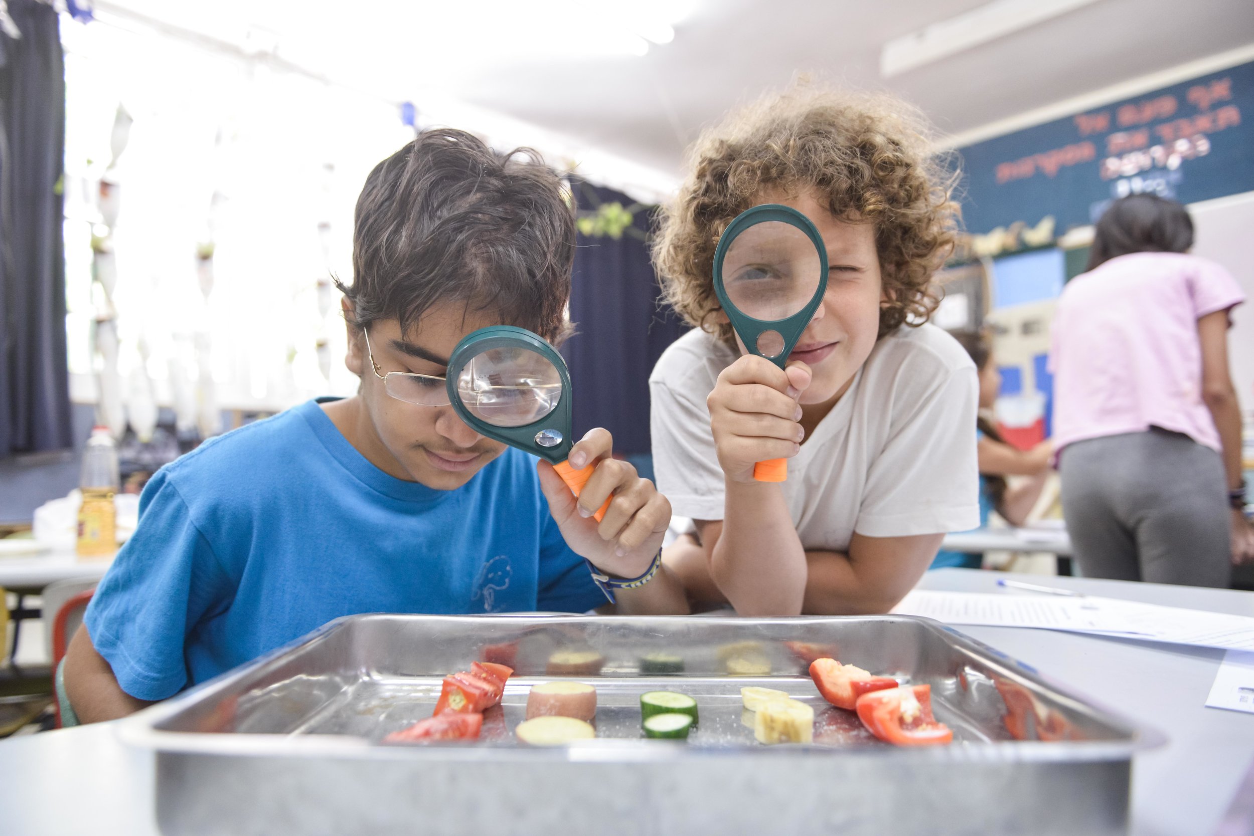 boys with magnifier-benny doutsh.jpg