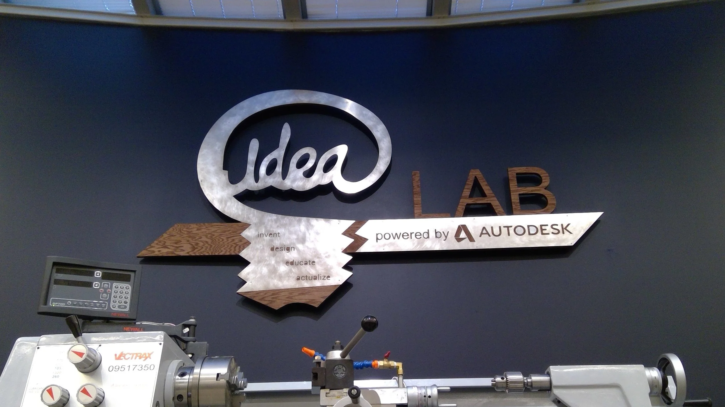 The final sign - in place and ready for the dedication. Special thanks to: Robert Garbee, for setting up the CNC router job Paul Cilino, for helping me prepare mounting hardware Bruce Barkley, who mounted the sign to the wall and did the final finish on the metal portion