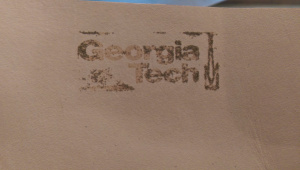 Despite a solid ink print, very little of the embossing powder stuck to the leather.