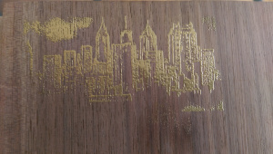 Walnut contrasted nicely against the gold powder, and its tight grain structure kept the strong vertical lines of this stamp distinct.