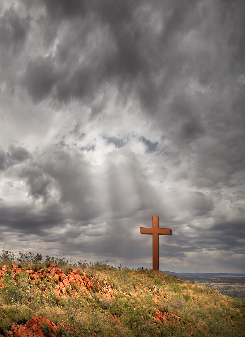 Artists impression of the cross under sun breaking through the clouds.