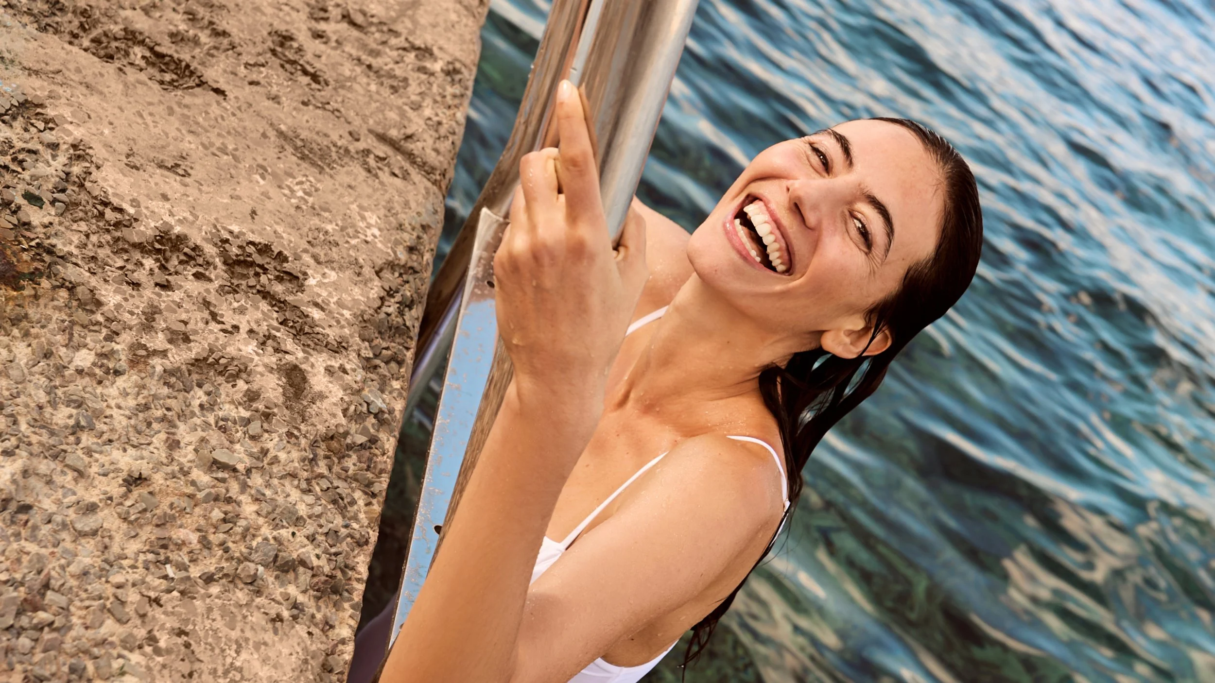 girl coming out of pool.jpg