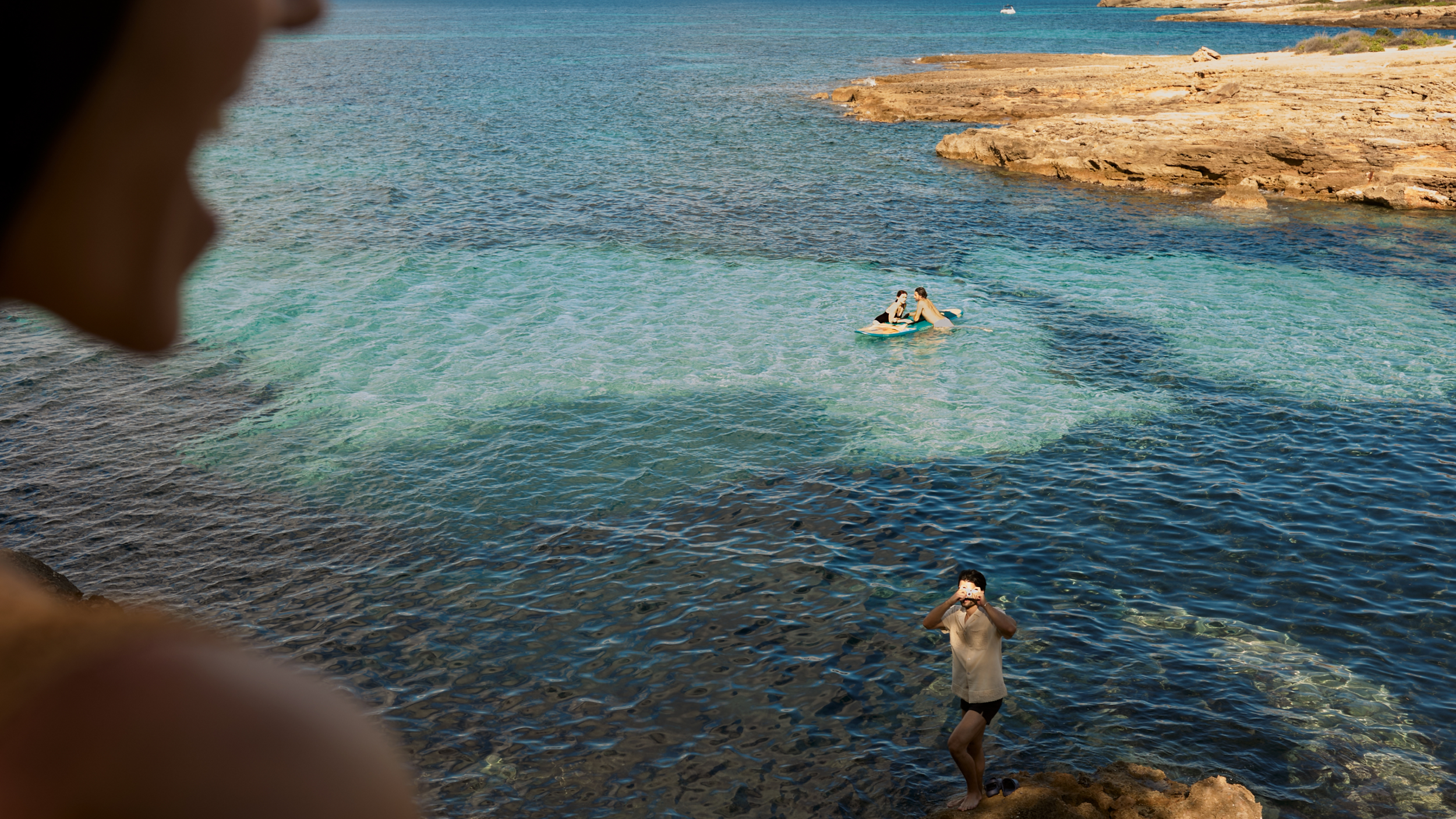 swim scene rocky water.png