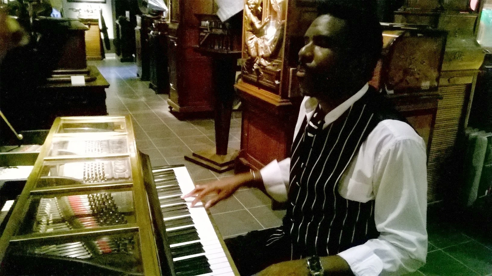 Playing the Piano at the Phono Museum in Paris, France