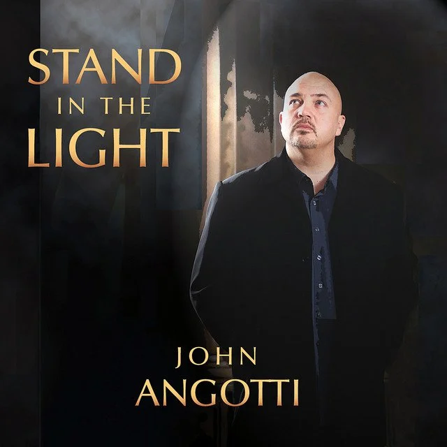 stand in the light album cover.jpeg