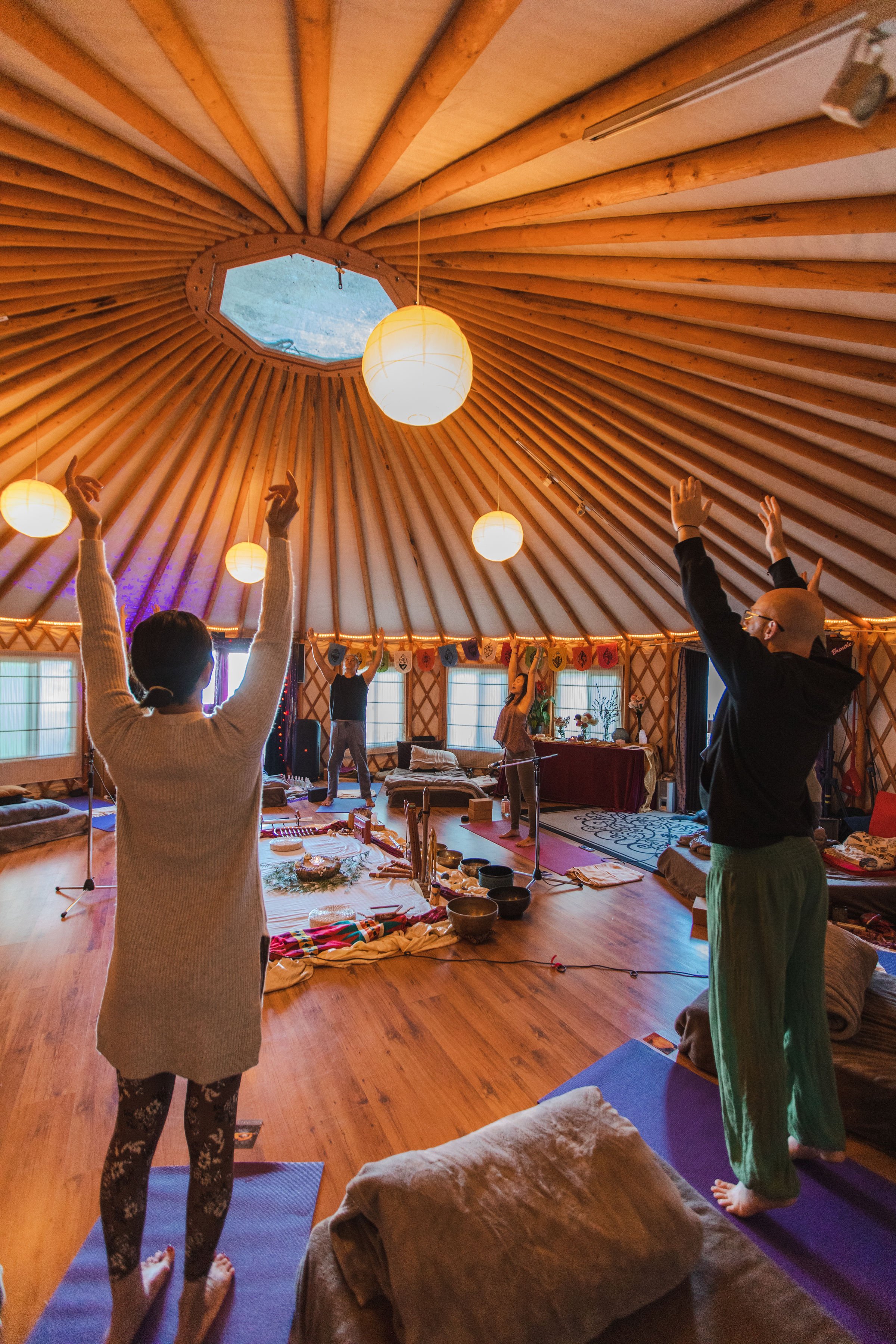 Reaching for light in yurt.jpg