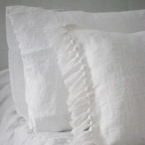 Fringed pillowcase detail.