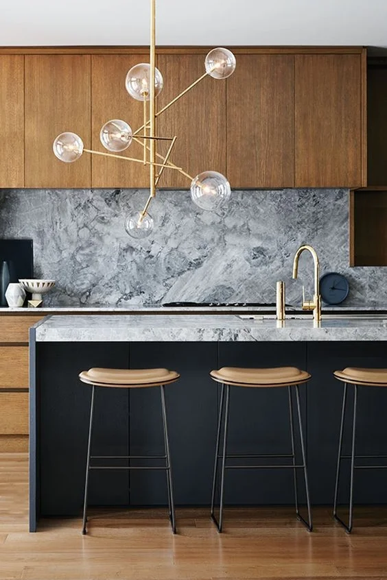 This modern take on Mid Century is a beauty, such a statement lighting piece for an island bench with matching tap ware finish! The choice of styling subtly referencing that mid century vibe.
