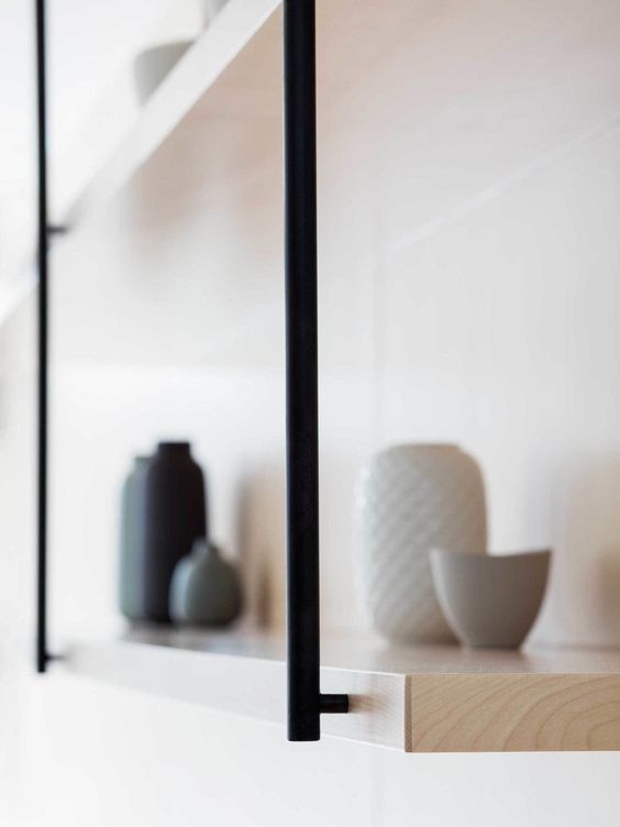Black powder coated steal detail on open shelves.