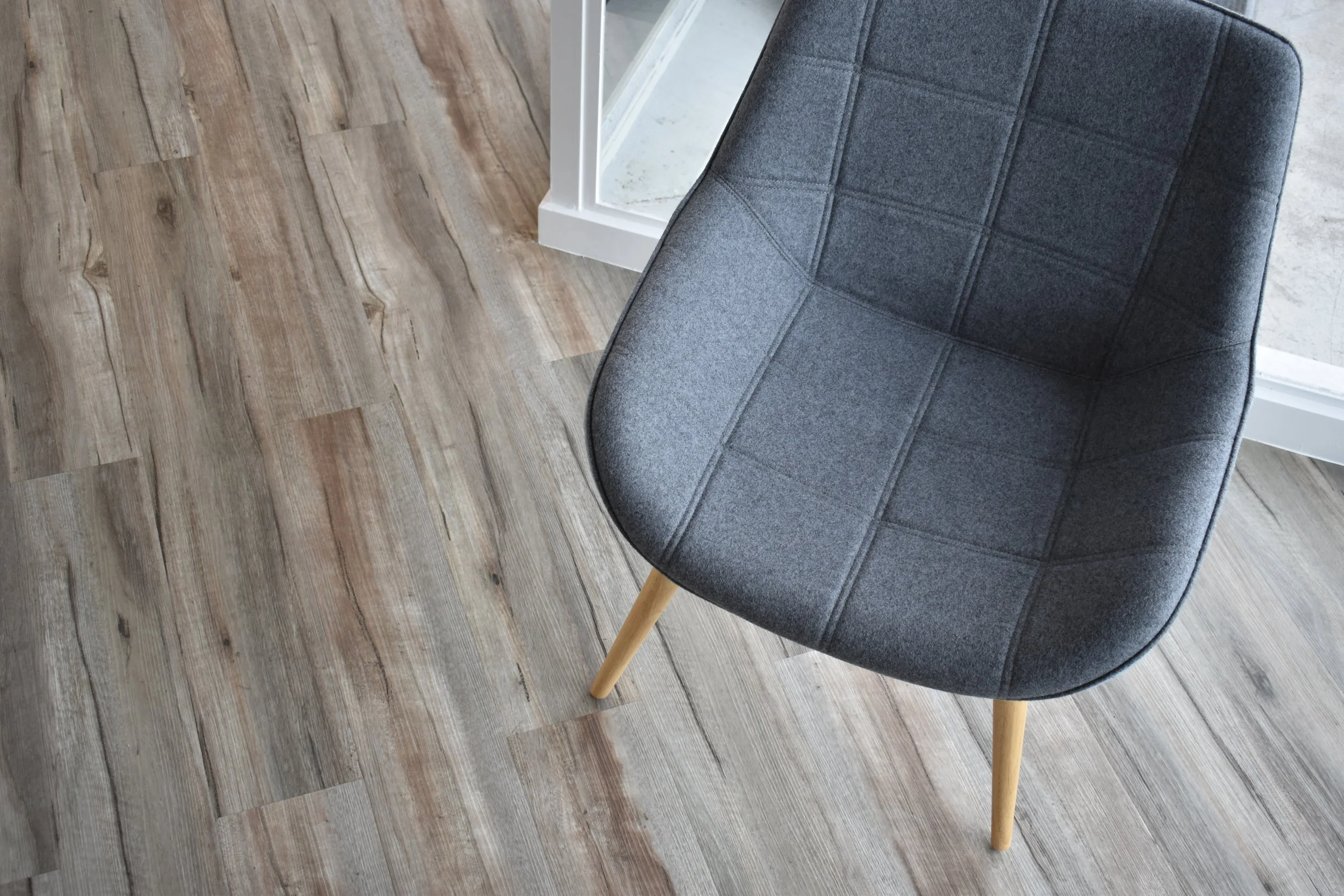 Additional soft seating added to make the space feel more inviting.
