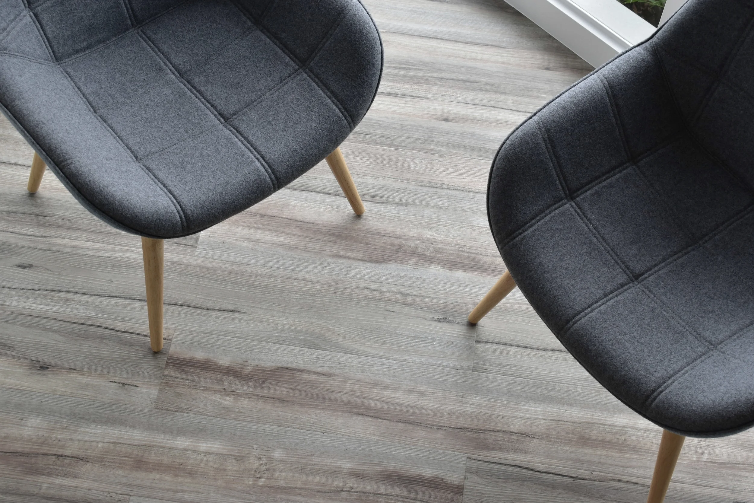 Soft seating and new wood plank viynl floor.