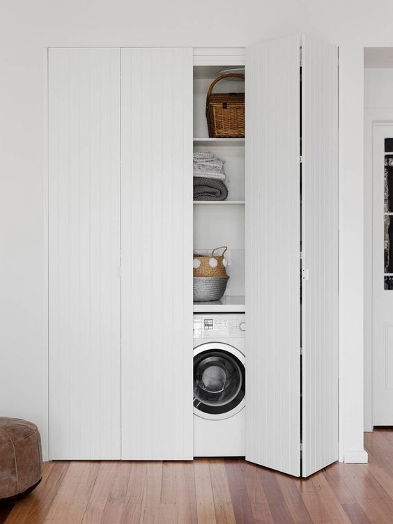 Laundries don't always have their own space, quite often it is in a cupboard off a hallway. In these situations its even more important to have a fantastic layout to get the maximum out of the small space. I really like how they have used open shelving so everything is easily accessible, and gone for a front load washer so they get plenty of bench space above.
