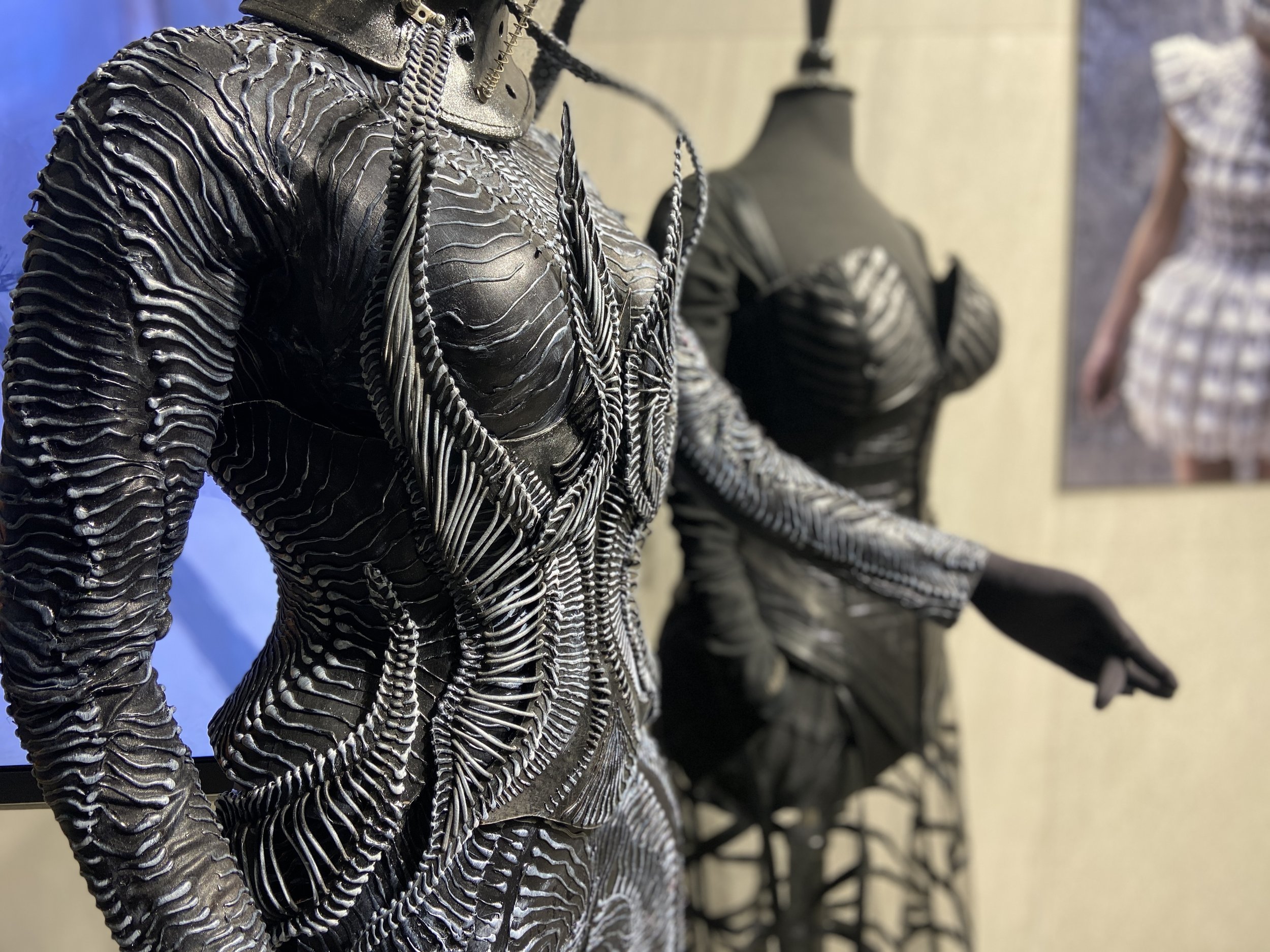   Katarzyna Konieczka  |  Alien  (2021) black body suit and  Crash   Collection  (2014) Neck Corset  Anita Yavich  |   Black Dress 