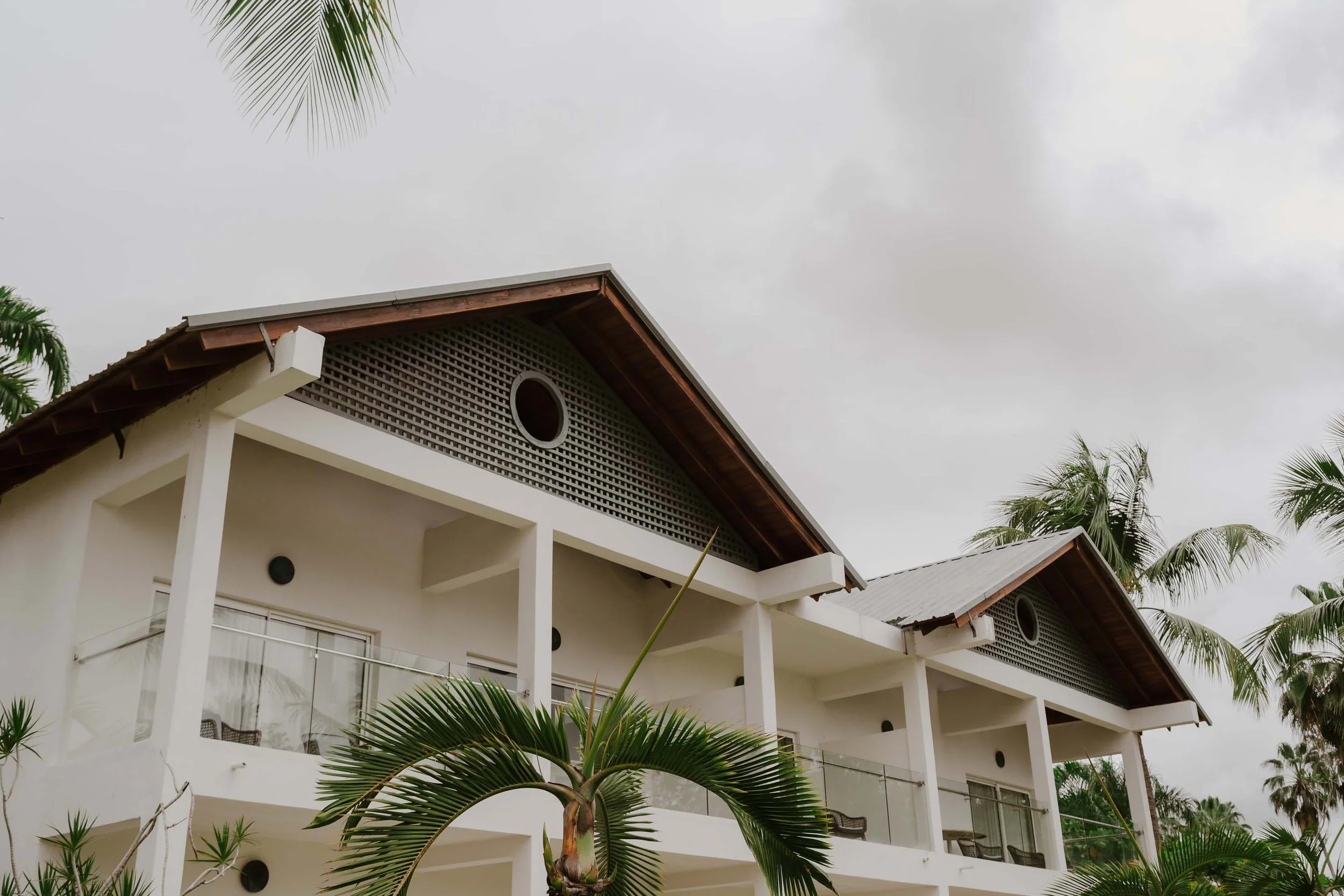 Tropical building in Secrets La Romana with the sky in the background