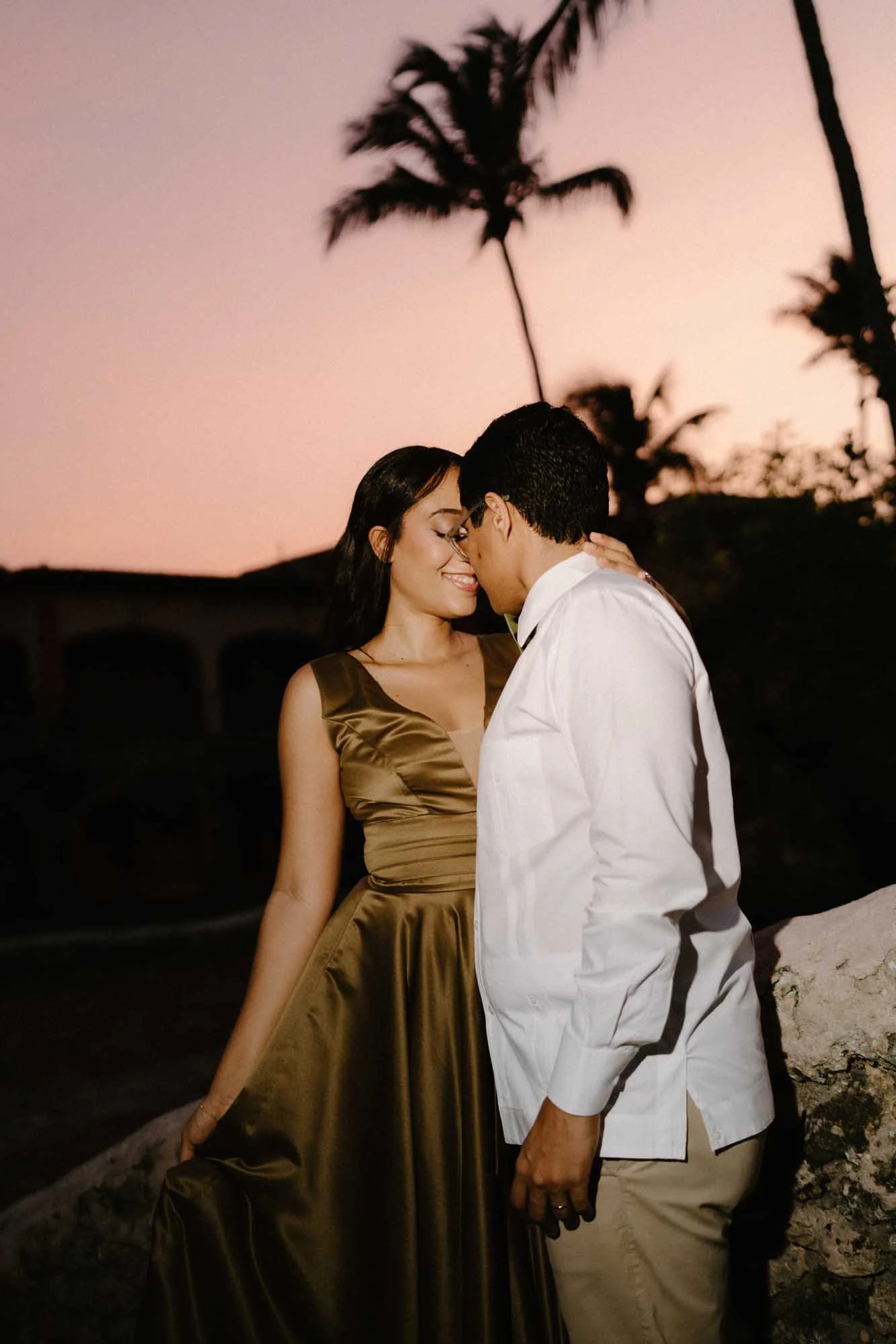 Couple with sunset at the background
