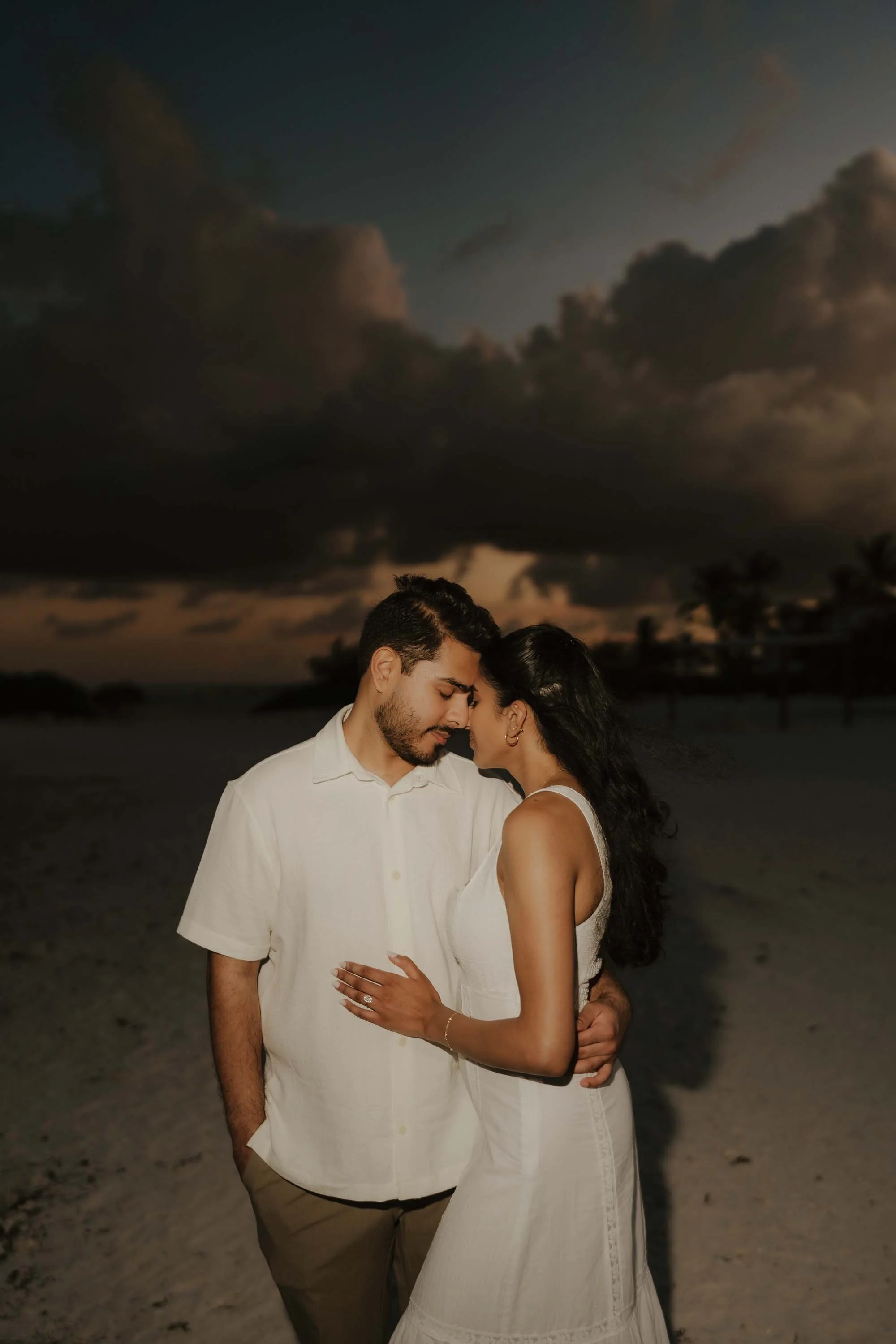 photo of the bride and groom in the sunset in playa juanillo in cap cana