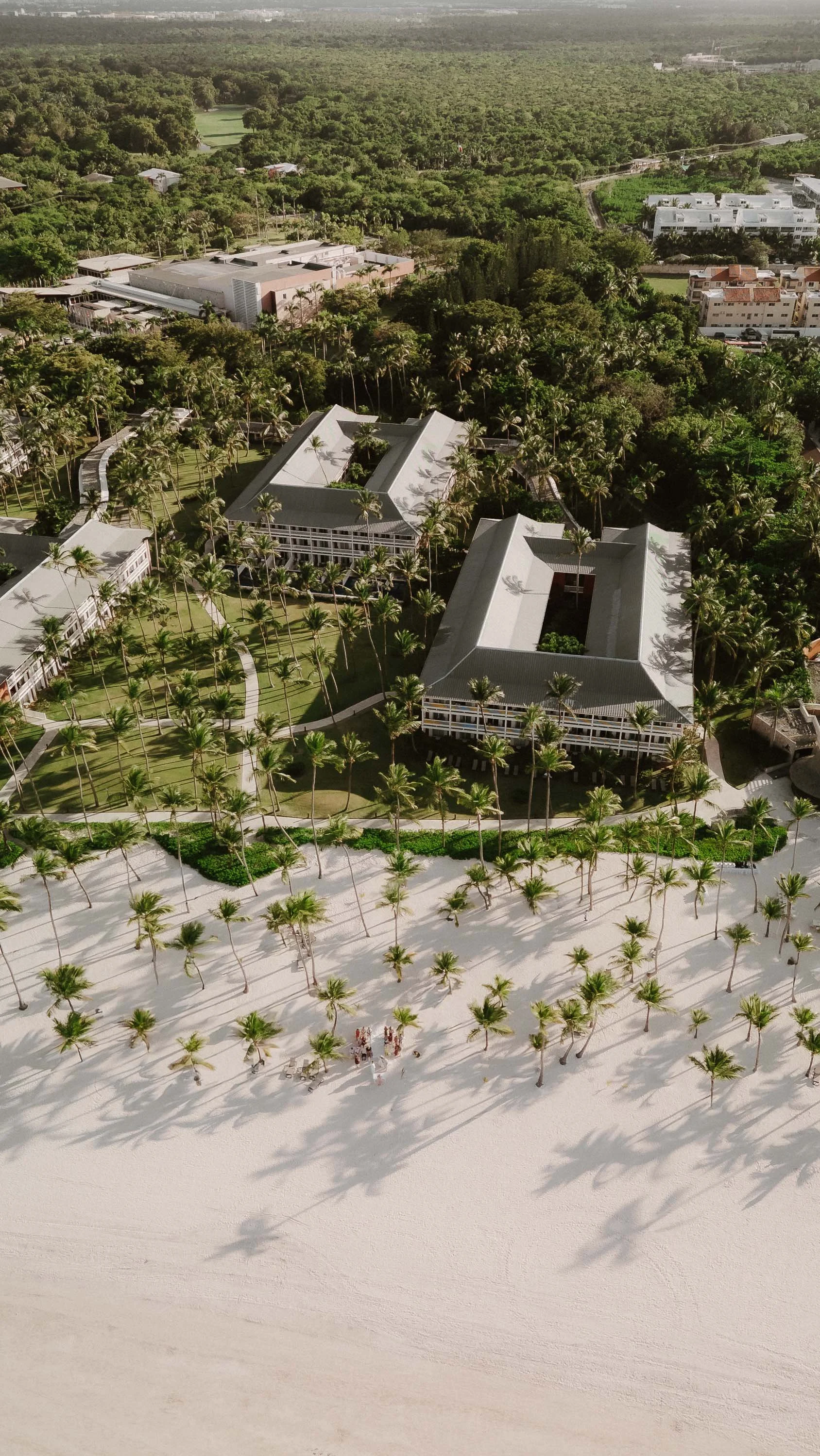 Drone photo from the view of Bavaro Palace, you can see the beach, the resort and the palms and sand.