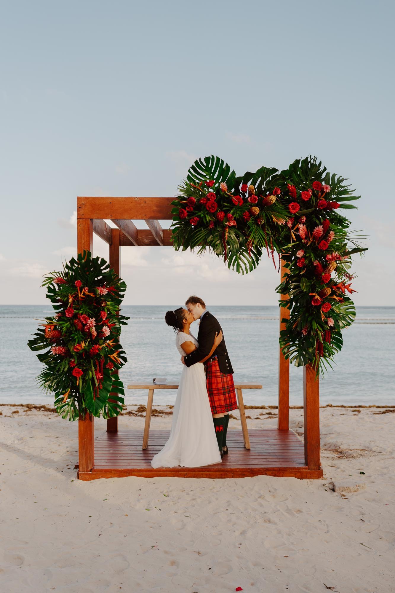 first kiss during ceremony chez bisutti wedding dominican republic punta cana destination wedding