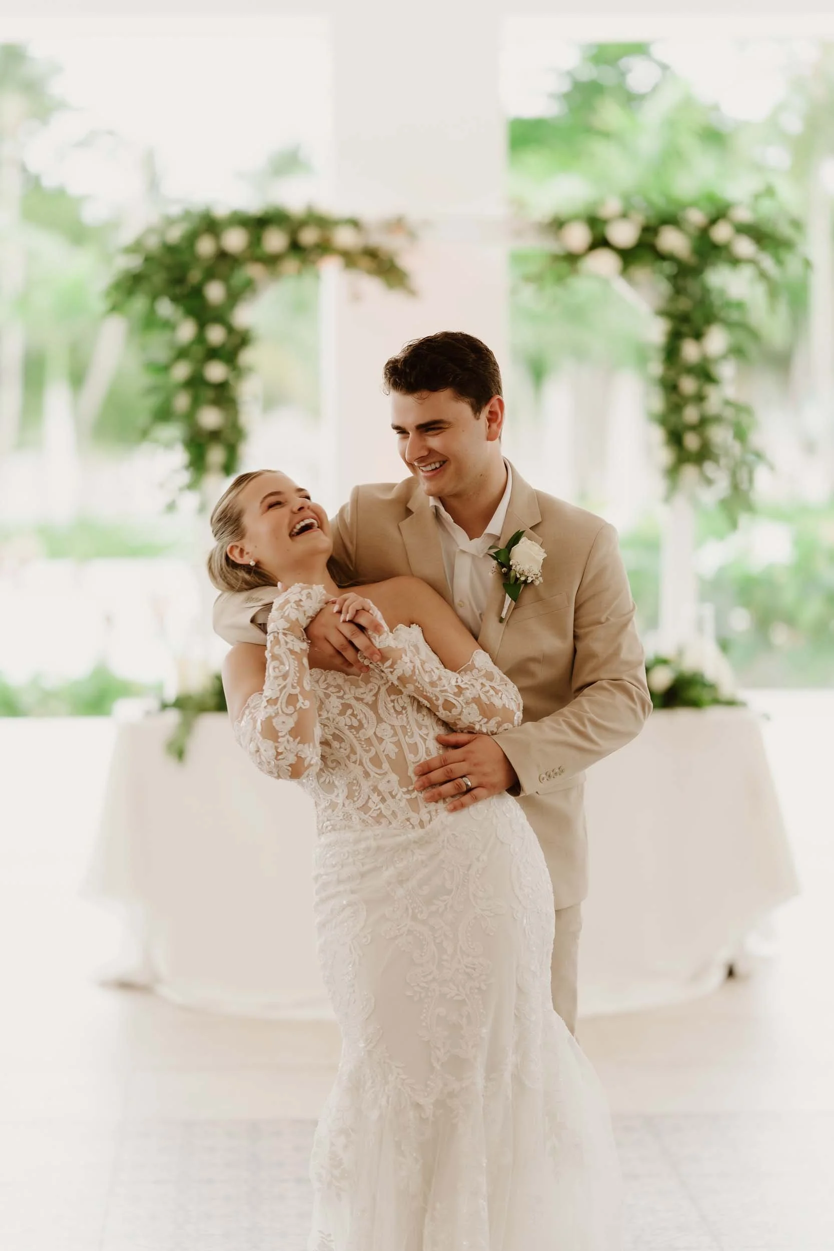 Bride and groom huging each other during their first dance