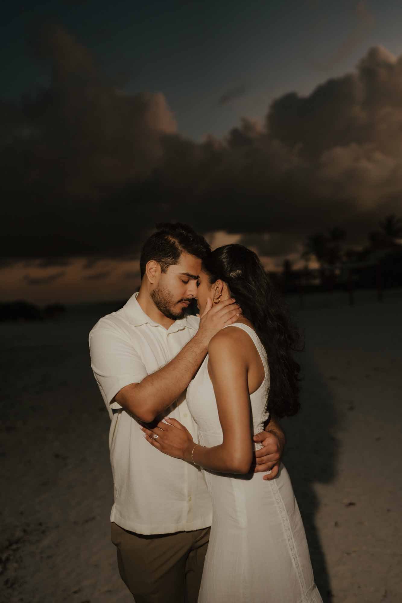 photo of bride and groom in the sunset in the beach in cap cana