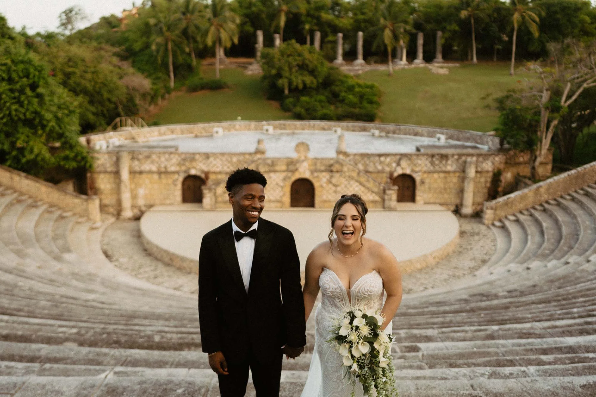 Couple laughing while posing for the camera in Altos de Chavon